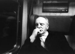 Old man on a train